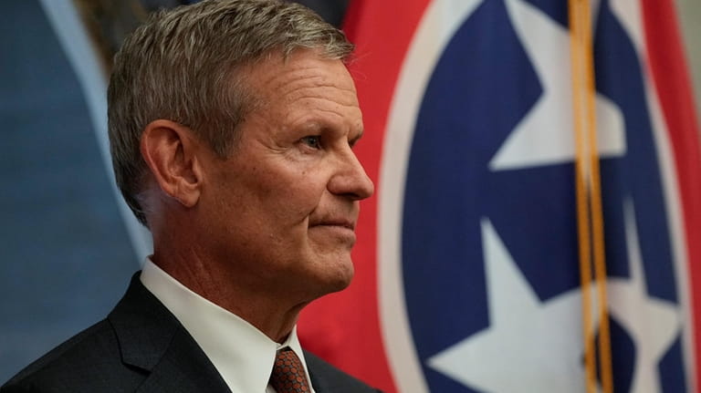 Gov. Bill Lee attends a news conference at the close...
